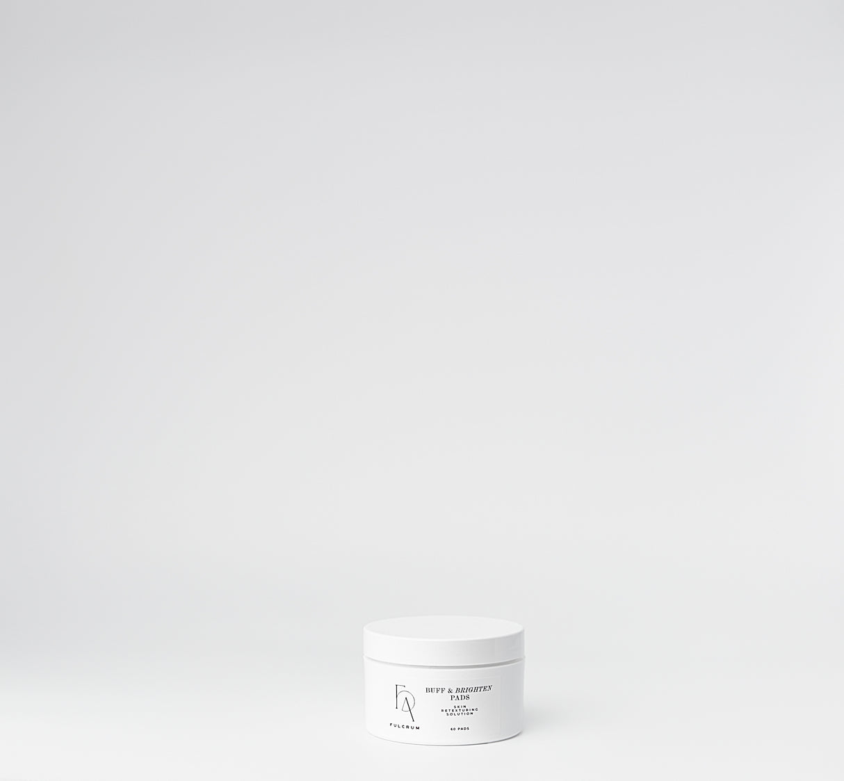 White jar with black label on a white background

